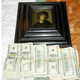 A Rembrandt valued at $35 million that Wittman recovered, pictured with $250,000 used to lure the suspects.